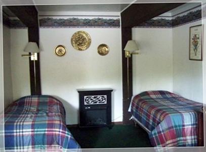 two twinn beds in Cabin #4 Timberline Lodge